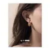 Pendientes de Diseño de Línea de Alta Gama Versátiles de Personalidad Europea y Americana Moda Simple Transfronteriza Personalidad de Nicho de Alta Calidad