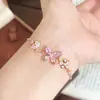 Pulsera de mariposa hueca con diamantes rosas de estilo dulce, moderna y versátil, cadena de cordón ajustable, accesorio de diseño simple de nicho