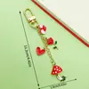 Llavero de corazón de hongo rojo y corazón de rosa transfronterizo para bolso de mujer colgante mejor amiga pequeño regalo