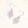 Brincos de prata esterlina Qiao Lanxuan com você no meu coração temperamento longo menina rosa brincos em forma de coração Coreano Net Red Jewelry