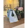 Bolso de Lona Decorado con Estrellas para Mujer 2026 Nuevo Estilo Coreano Diseño de Nicho Bolsa de Almacenamiento Portátil Linda Bolsa para Viajar