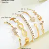 Pulsera de tulipán de diseño europeo y americano de alta gama transfronteriza con mariposa de 8 caracteres, accesorios de 5 piezas, venta al por mayor de fábrica de Yiwu