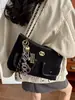 Bolso tote de cadena estilo Chanel pequeño para ir al trabajo sensación de alta gama bolso de un solo hombro gran capacidad nuevo estilo bolso cruzado para mujer bolso cubo