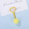 Llavero colgante de corazón con pompón de colores, accesorios DIY, llavero de cuentas, cadena para teléfono, colgante para bolso, pequeña decoración al por mayor