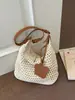 Bolso de hombro versátil de gran capacidad, tejido estilo coreano, para mujer, nuevo modelo 2026, estilo casual de vacaciones, bolso de playa