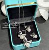 Collar de Princesa Escape con Lazo, Piedras Preciosas y Perlas, Anillo de Mar Profundo Farah con Cuentas, Set de Anillos de Zirconia Mariposa