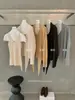 Conjunto de Cárdigan de Punto Irregular con Lazo Estilo Coreano Otoño + Camisola Ajustada de Cuello en V para Mujer 395