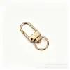 Chaveiro de Liga de Zinco Formato de Porta Fivela Formato de Cachorro Liga de Zinco Ecológica Gancho de Pingente para Joias Acessórios de Bagagem Venda por Atacado Fornecimento Direto