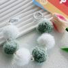 Otoño e Invierno nuevo pompón de piel con cuentas de perlas cadena portátil adornos de bolso funda para teléfono móvil cadena colgante cadena corta para muñeca para mujer
