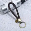 Chaveiro de corda de couro trançada à mão com acabamento escovado bronze, chaveiro de casal, chaveiro de carro masculino e feminino, corda de mão para presente