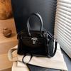 Comercio Exterior Super Caliente Bolsa Pequeña Mujer Primavera y Verano 2025 Nuevo Bolso Bandolera de Hombro Versátil Casual Nicho Portátil Bolso Kelly