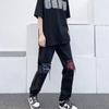 Vaqueros ajustados elásticos de estilo hip-hop para hombre, de moda, con parches bordados de flores de anacardo, estilo hip-hop, para tiendas transfronterizas de Amazon, Europa y América.