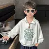 Sudadera con media cremallera estampada para niños, de primavera y otoño, estilo coreano, chaqueta elegante y moderna para niños, top genial para niños pequeños