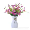 Flor artificial al por mayor hierba acuática plástico hierba de primavera flor Violeta acabado impresión serigráfica flor pequeña Margarita flor falsa accesorios decorativos Flor
