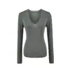 Camiseta básica de punto de manga larga con cuello en V profundo para mujer, otoño 2026, ajustada, adecuada tanto para llevar sola como debajo de otra prenda, top tipo camiseta de algodón de alta elasticidad