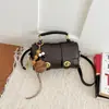 Bolso pequeño simple y elegante estilo coreano de alta costura Shuai Mi Jia, nuevo bolso cruzado de un solo hombro para mujer Otoño 2026