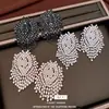 Aretes de Aguja Plateada con Borlas Geométricas Incrustadas de Diamantes, Lujo Ligero y Sensación de Alta Gama, Diseño Exquisito Simple y de Moda, Aretes de Nicho