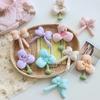 Nueva primavera flor de trébol de seda brillante algodón lazo tridimensional flor de tres pétalos corazón de niña accesorios de ropa