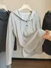 Camiseta de punto de manga larga a rayas con capucha estilo coreano para mujer, nuevo modelo otoño 2026, chaqueta top casual holgada versátil de moda