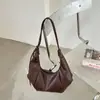 Bolso de mujer de alta gama, gran capacidad, nuevo estilo 2026, moderno, otoño/invierno, retro, diseño de nicho, bolso cruzado, para el trabajo, bolso tipo dumpling