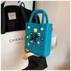 Suministro transfronterizo nueva bolsa mini de EVA con agujeros DIY pequeña fresca impermeable sin lavado bolsa de playa bolsa de hombro cruzada