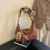 Bolso grande de mujer de nuevo diseño para principios de otoño 2026, bolso de hombro y bandolera de color liso a la moda, bolso tipo empanada casual para el día a día
