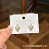 Brincos de Tarraxa com Pedras Strass e Pérolas Imperatriz Saturno para Mulheres, Design de Nicho Brincos de Prata S925, Novo Estilo Popular Brincos Elegantes