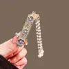 Pinza para el pelo con borla de perlas y flores azules estilo francés para mujer, nuevo clip para patillas laterales, pinza de pico de pato para flequillo, accesorio de moda para el cabello