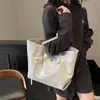 Bolsa tote de gran capacidad, nuevo modelo 2026, con un tacto sofisticado y lujoso, hecha de cuero suave, una bolsa de hombro grande adecuada para el trabajo y los desplazamientos, y puede albergar un portátil