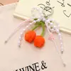 Nuevo Colgante de Teléfono Móvil Tulipán Tejido a Crochet de Lana Colgante para Bolso Serie Miu Cadena Versátil de Colgar para Teléfono Móvil con Lazo