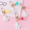 Chaveiro Pingente Ins Tendência Anjo de Asas Brancas Bola Colorida de Gelatina Acessório Personalizado para Bolsa e Capa de Fone de Ouvido