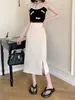Falda casual para mujer talla grande gordita verano nuevo diseño con sentido de la moda pequeña que estiliza cintura alta longitud media línea A falda larga