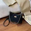 Bolso de cadena para debajo del brazo con patrón de rombos estilo Chanel pequeño para mujer 2026 nuevo de moda popular bandolera de un solo hombro bolso hobo versátil
