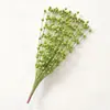 Decoración navideña bola dorada racimos de pistacho racimos de bayas doradas esquejes dorados tenedorcito flor artificial hilo de pez fruta