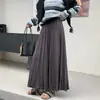 Elegante saia plissada de cintura alta estilo retrô para mulheres, novo estilo para o início do outono de 2026, saia plissada de corte A que afina a silhueta e é estilosa, com barra larga