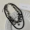 Collar de lujo ligero y oscuro con cuentas negras multicapa apiladas, personalizado para mujer, con cruz de amor, cadena de clavícula de nicho.