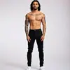 Marca Independiente 2026 Verano Europeo y Americano Estilo Callejero para Hombre Jeans Hip-Hop Versátiles Ajuste Delgado Pantalones Skinny Lavados Venta al por Mayor