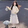 Sudadera de retazos a rayas de dos piezas estilo coreano para primavera y otoño 2026 nuevo modelo conjunto de dos piezas de falda de encaje de longitud media para niñas