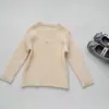 Suéter de Ganchillo para Niñas 2026 Otoño Nueva Llegada Color Sólido Dulce Suave Jersey Suéter Tejido para Niños Moderno