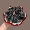 Goma para el pelo scrunchie floral vintage para mujer, accesorio para el pelo de estilo casual y de alta gama, nuevo modelo 2026 para moño