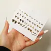 Conjunto de Brincos Pequenos Personalizados Estilo Europeu e Americano, Brincos Compactos para Usar a Semana Toda, Brincos de Venda Quente do Comércio Exterior Transfronteiriço, Preço Especial