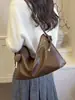 Bolsa Tote Transfronteiriça Retrô para o Dia a Dia Grande Capacidade Feminina 2026 Nova Bolsa de Mão Casual Alta Aparência Moda Bolsa de Ombro Único