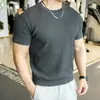 Estilo novo de verão moda de Hong Kong tendência modelagem solta design de nicho T-shirt masculina versátil adequada para uso diário em 2026