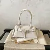 Bolso de mano pequeño cuadrado casual estilo coreano para mujer, nuevo bolso de hombro simple de moda primavera 2026 para el trabajo y los desplazamientos, bolso cruzado