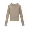 Camiseta de punto básica de cuello redondo coreana para mujer Primavera y Otoño 2024 Nueva Popular Suave Cera Manga Larga Cintura Ajustada Aspecto Adelgazante Top