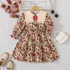 Vestido Infantil Feminino Estampado Floral Retrô & Vestido Princesa Infantil de Primavera/Outono com Gola Boneca e Laço Manga Longa