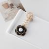 Llavero con perla de camelia estilo Chanel de estilo francés, colgante personalizado para bolso, adorno para llavero de coche de mujer.