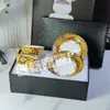 Suministro directo transfronterizo Juego de taza de café H de moda Juego de té de la tarde europeo taza de té negro café 2 tazas 2 platos caja de regalo