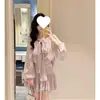 Conjunto de dos piezas para mujer de talla grande: camisa de manga larga estilo francés con lazo suave + minifalda plisada de cintura alta para mujer