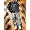 Camiseta de anime de manga corta estilo japonés para hombre, top casual versátil de verano de estilo americano de alta calle, holgado, con conjunto de jeans, moderno